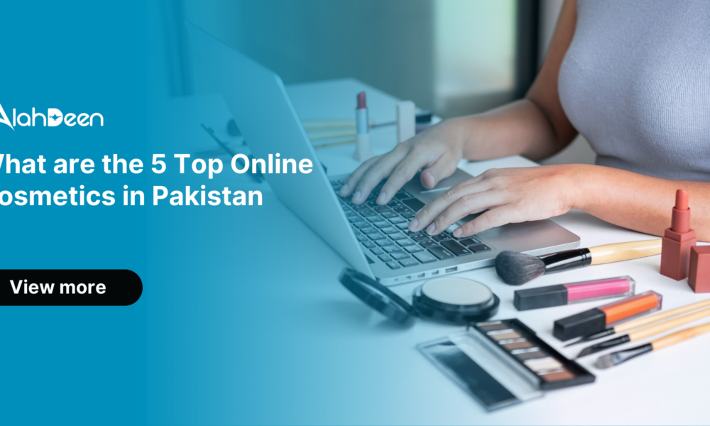 Person typing on a laptop with makeup items like brushes, lipsticks, and eye shadow palettes on the desk - Alahdeen logo with text 'What are the 5 Top Online Cosmetics in Pakistan' and 'View More' button.