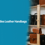 Display of ladies leather handbags in black and brown shades on wooden shelves, featured in a promotional banner by Alahdeen.